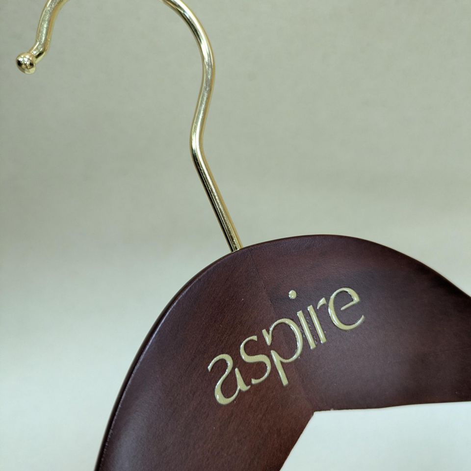 Why Branded Wooden Hangers Are a Small Detail That Make a Big Impact