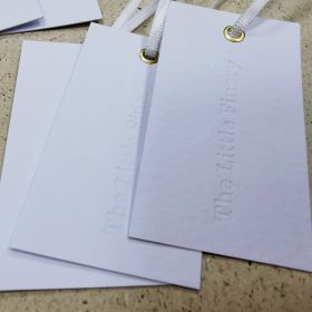 Debossed swing tag - Little Finery