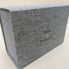 Foldable magnetic box with fabric