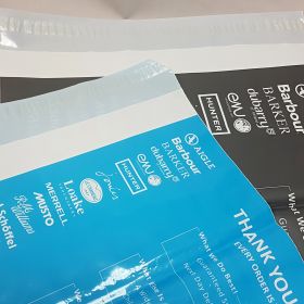 grey and blue mailing bags